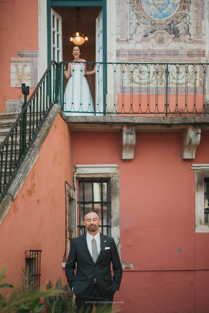 Bride and groom sharing a first look on a Lisbon terrace before exchanging vows during their intimate micro-wedding.