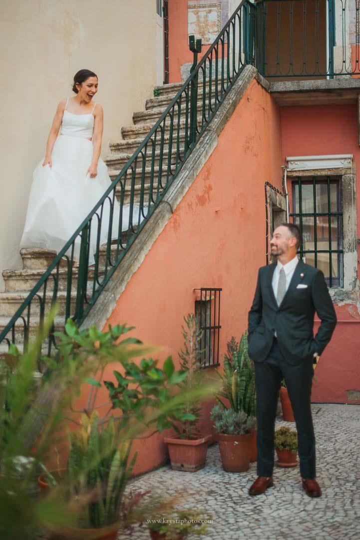 Bride and groom sharing a first look on a Lisbon terrace before exchanging vows during their intimate micro-wedding.