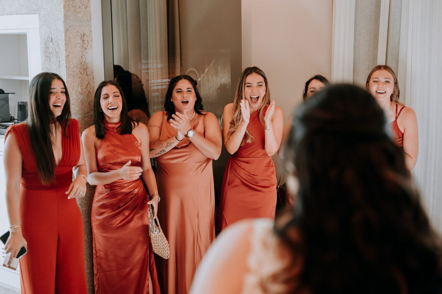 First look of bride with bridesmaids