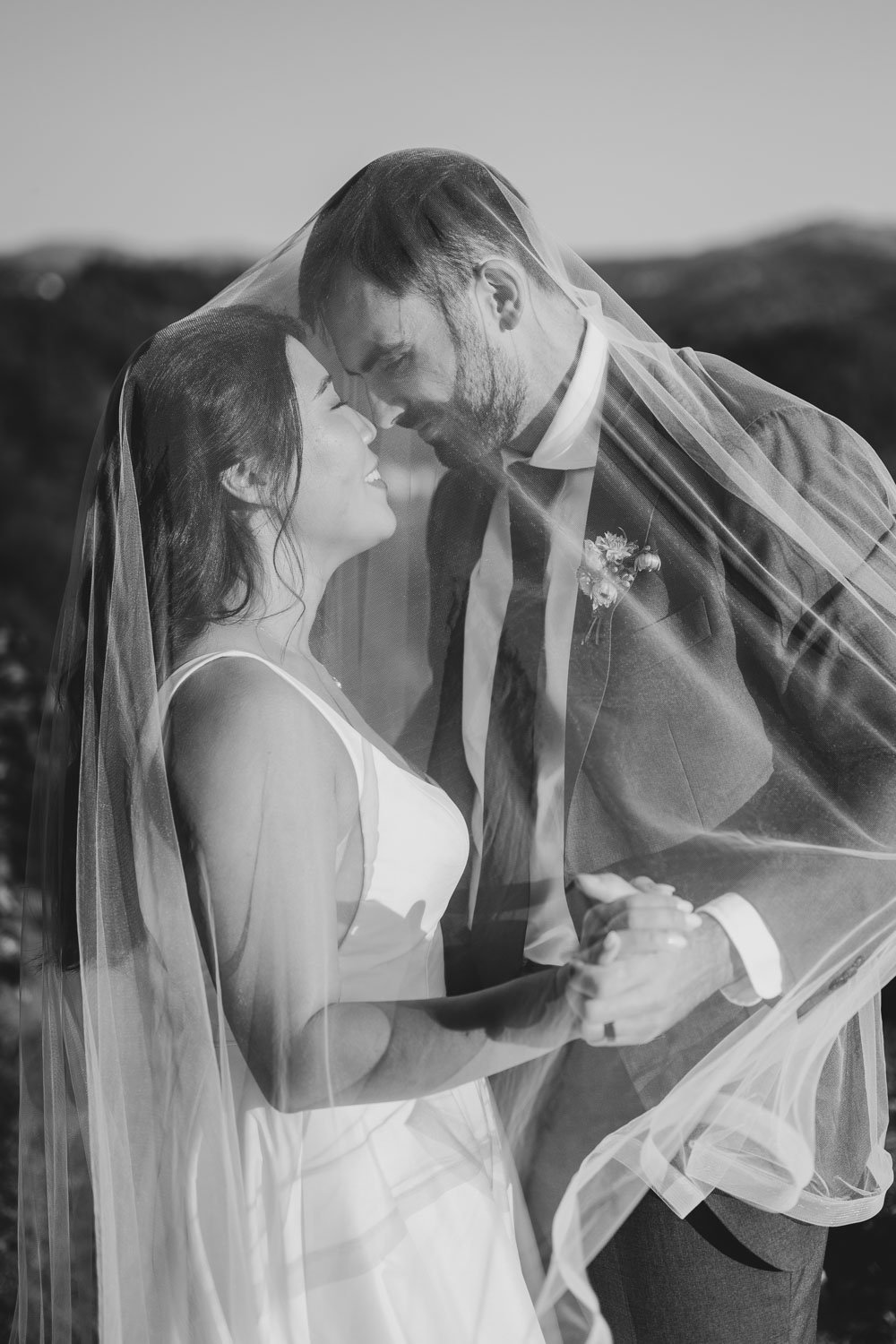 Bride and groom golden hour portraits overlooking the Douro River during an intimate wedding in Portugal