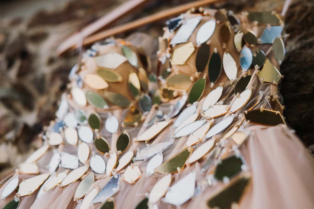 Close‑up of whimsical wedding dress detail at Portugal vineyard