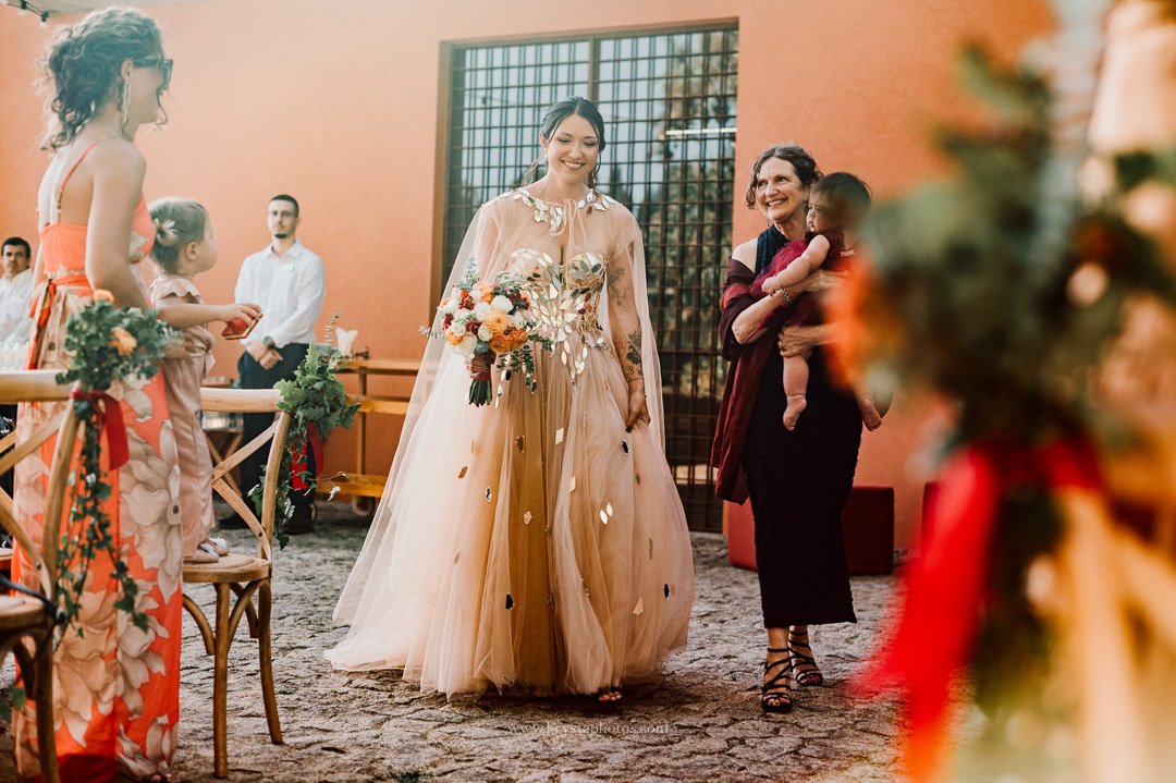 Whimsical vineyard wedding portrait in Portugal with bride in alternative wedding dress