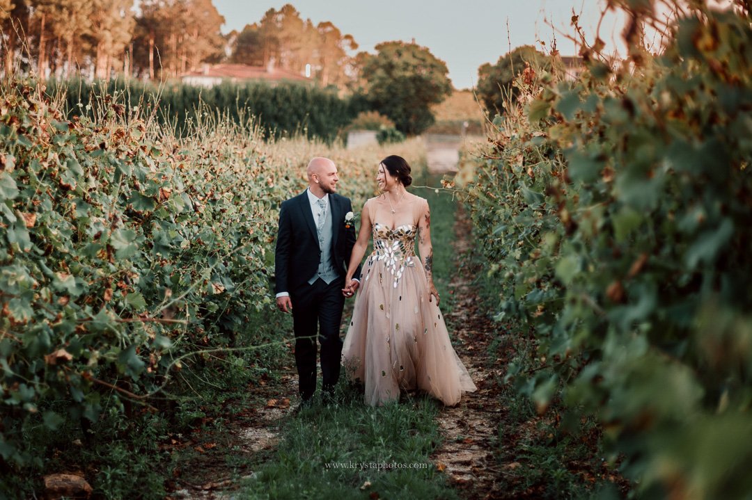 Whimsical vineyard wedding portrait in Portugal with bride in alternative wedding dress