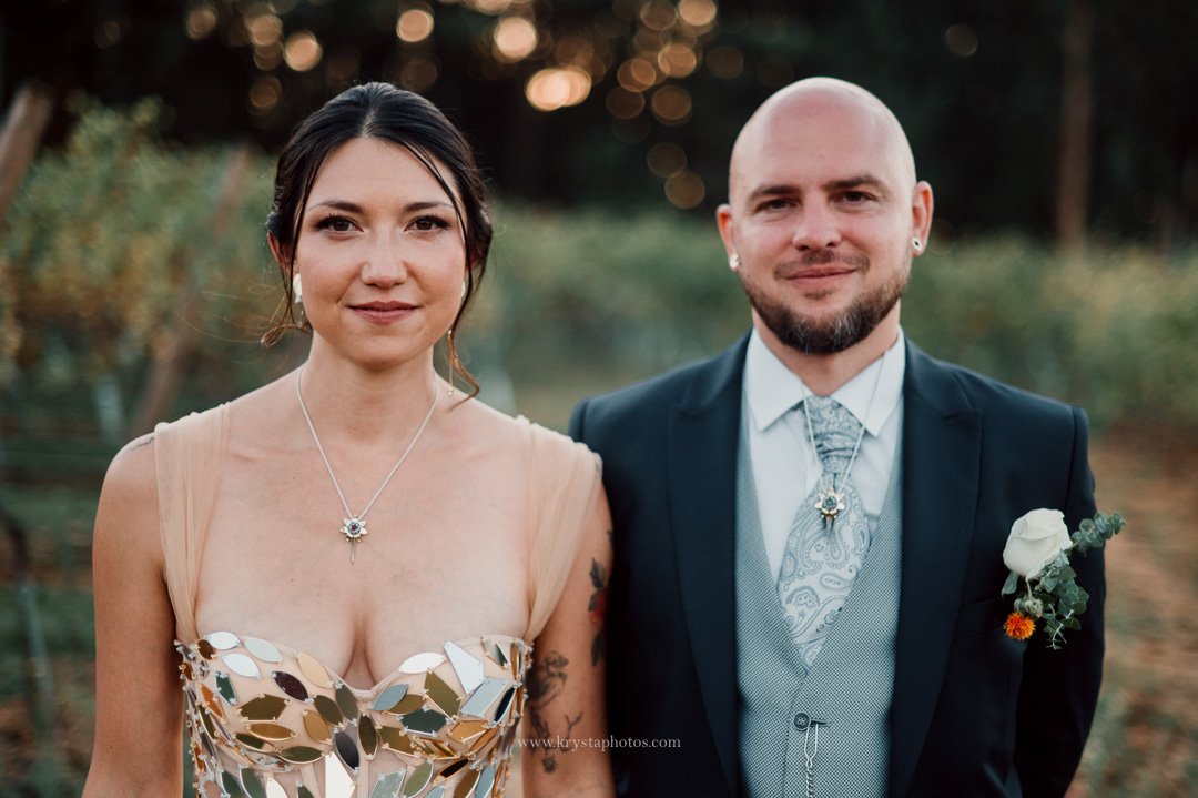 Whimsical vineyard wedding portrait in Portugal with bride in alternative wedding dress