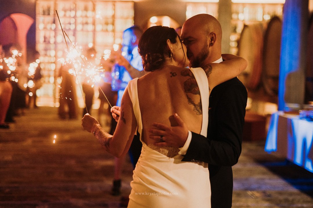 Bride and groom’s magical sparkler exit at whimsical vineyard wedding in Portugal
