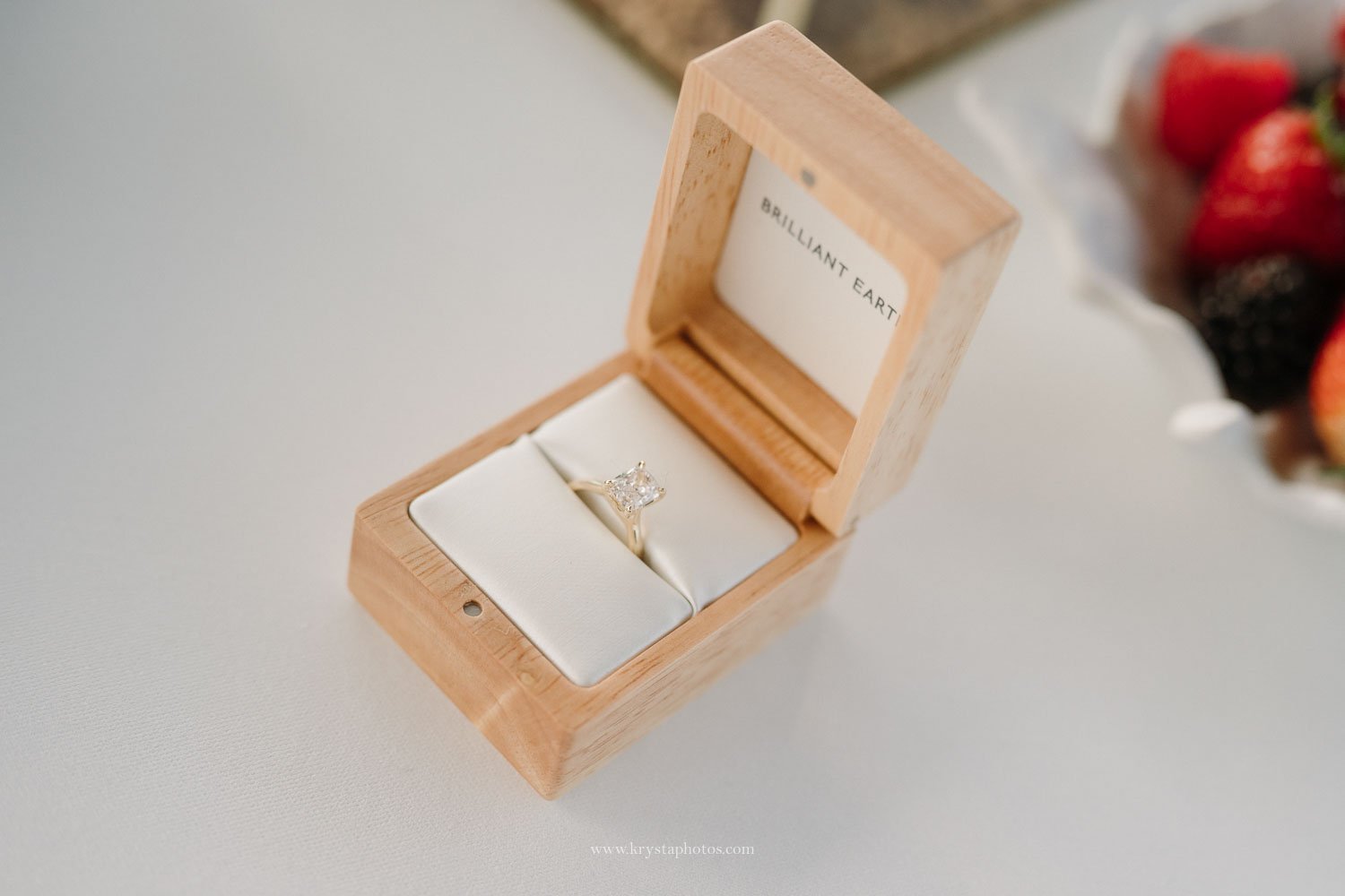 Engagement ring in wooden box prepared for a surprise marriage proposal in Porto Portugal