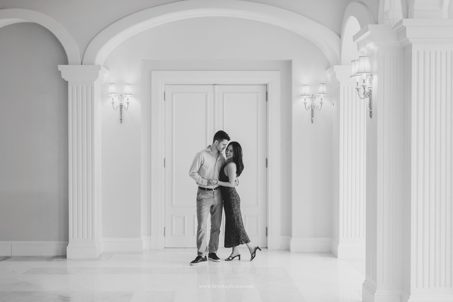 Couple posing inside the luxury interior of The Yeatman Hotel Porto during engagement photos