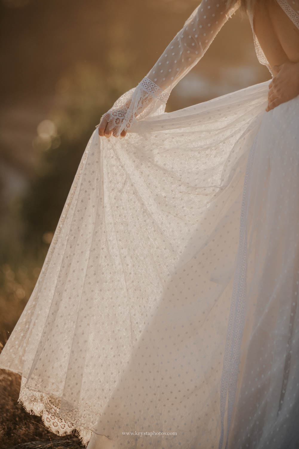 Boho chic bridal dress detail in warm natural light from wedding editorial photographed in Portugal