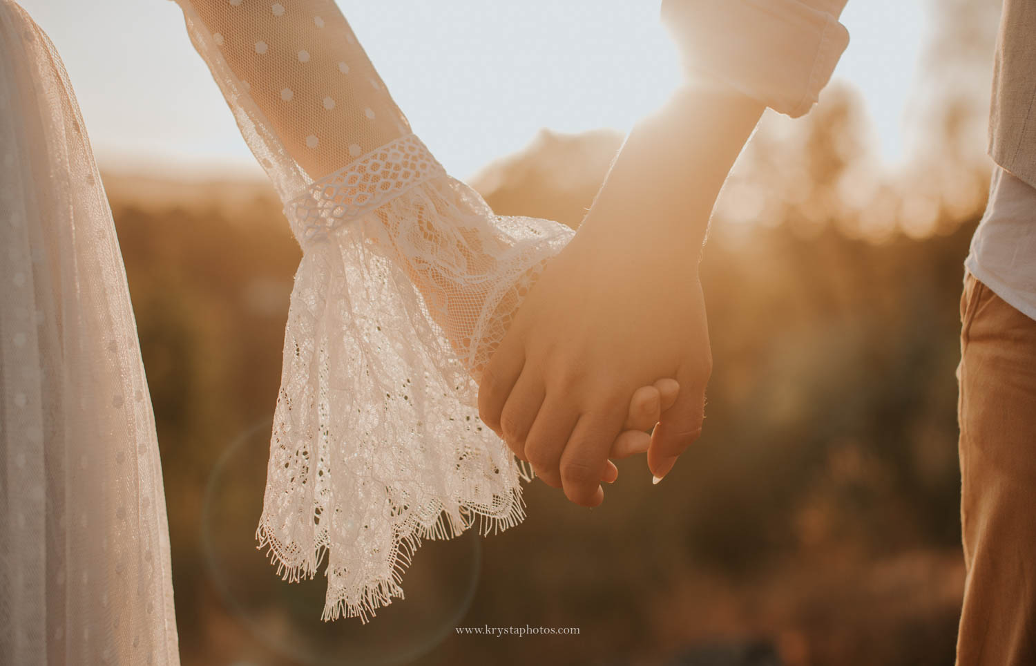 Boho chic wedding editorial couple holding hands at sunset in natural light photographed by Portugal wedding photographer