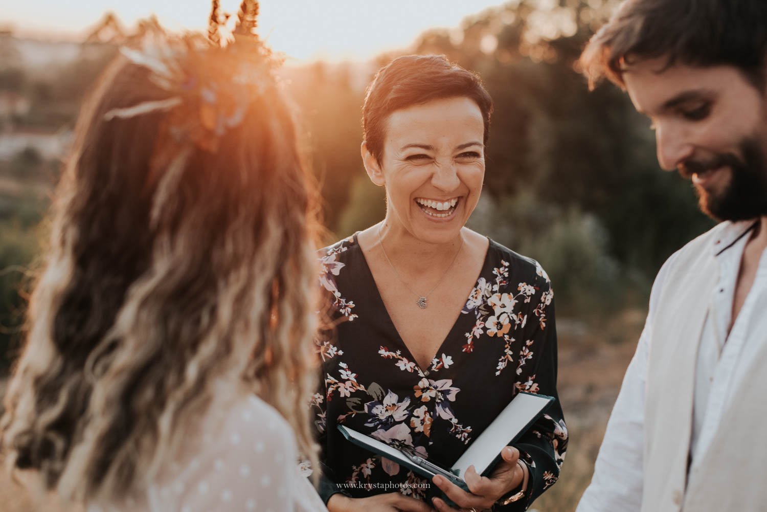 Intimate wedding ceremony with celebrant at golden hour during boho chic wedding editorial in Portugal