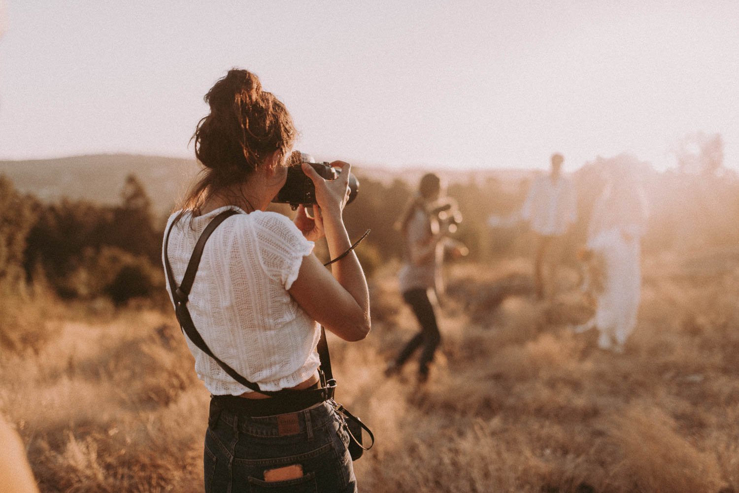 Behind the scenes of boho wedding editorial photographed by Porto wedding photographer at golden hour