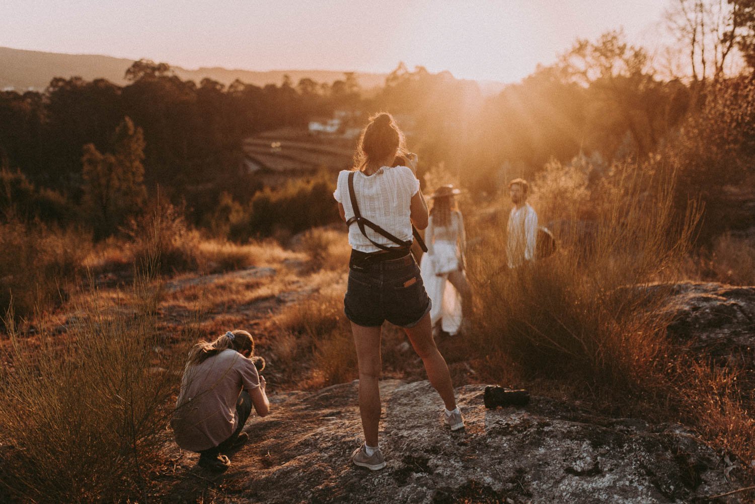 Behind the scenes of boho wedding editorial photographed by Porto wedding photographer at golden hour