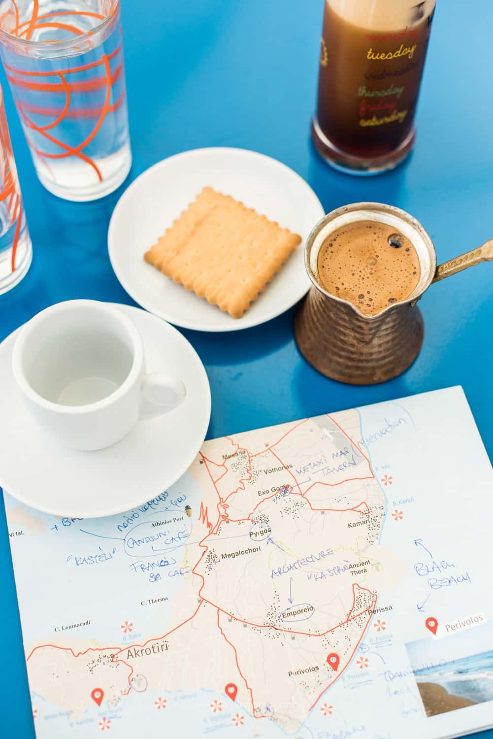 Marriage proposal on the iconic red staircase of Livraria Lello in Porto, Portugal, surrounded by tourists.