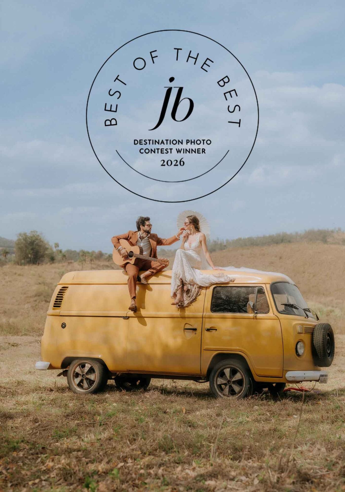 Award-winning destination wedding photo by Krystallenia Batziou KrystaPhotos, bride and groom on vintage yellow VW van playing guitar, Junebug Weddings Best of the Best 2026