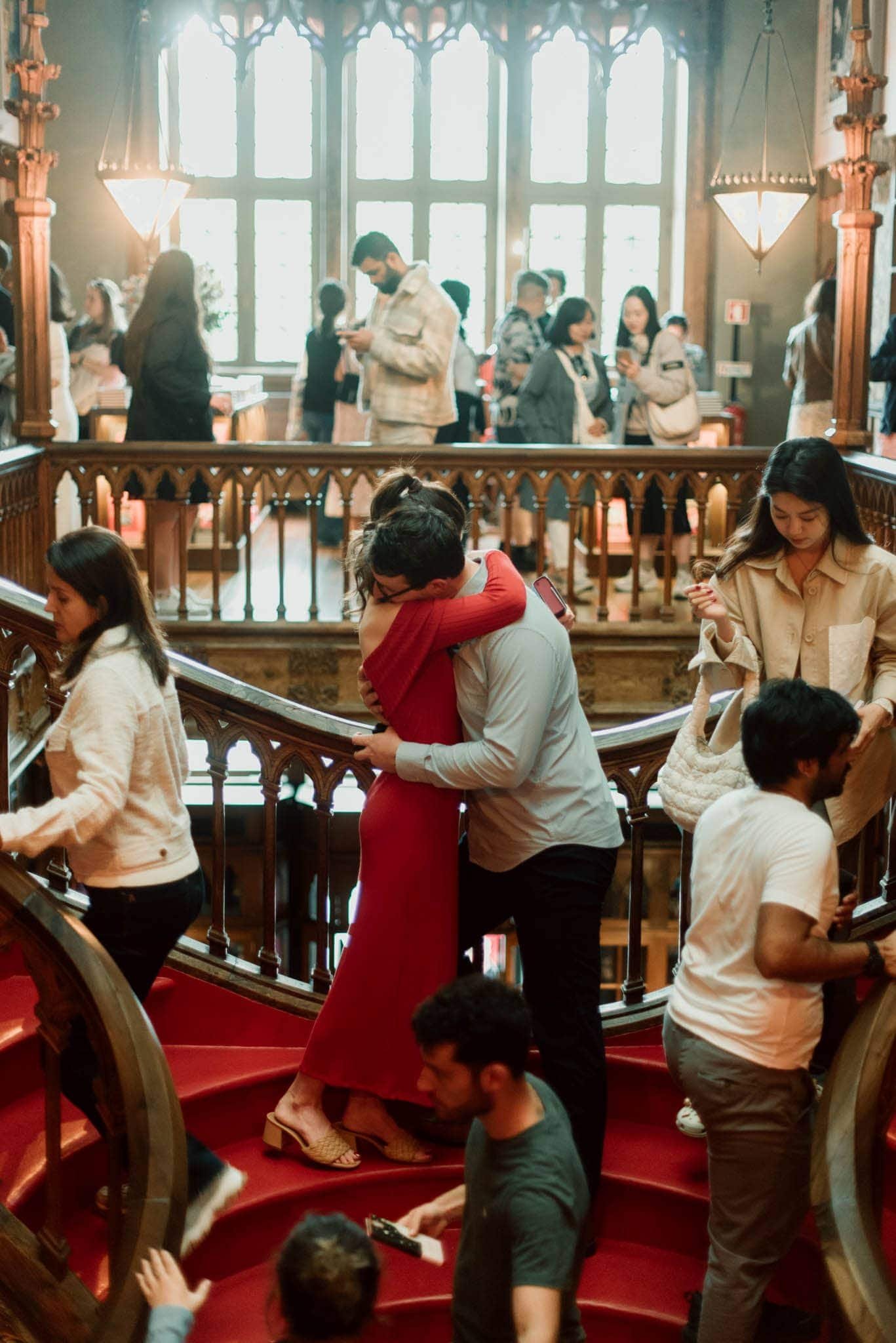 surprise engagement photoshoot at Livraria Lello, in Porto